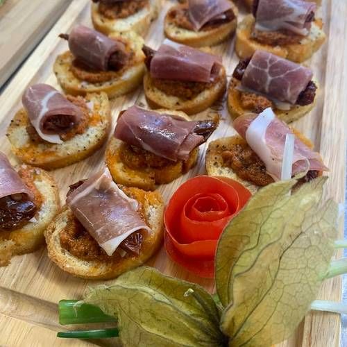  Crostini with red pepper and sundried tomato pesto finished with prosciutto ham